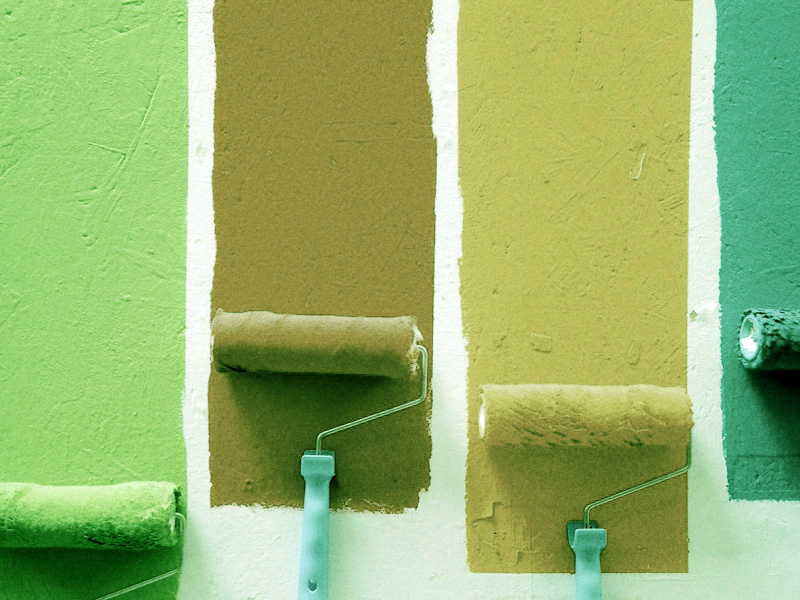 paint rollers painting bold stripes